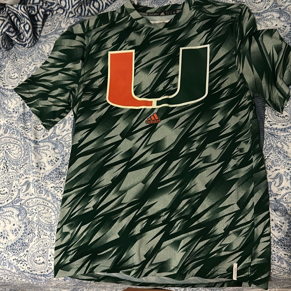 Small green Miami Hurricanes athletic shirt